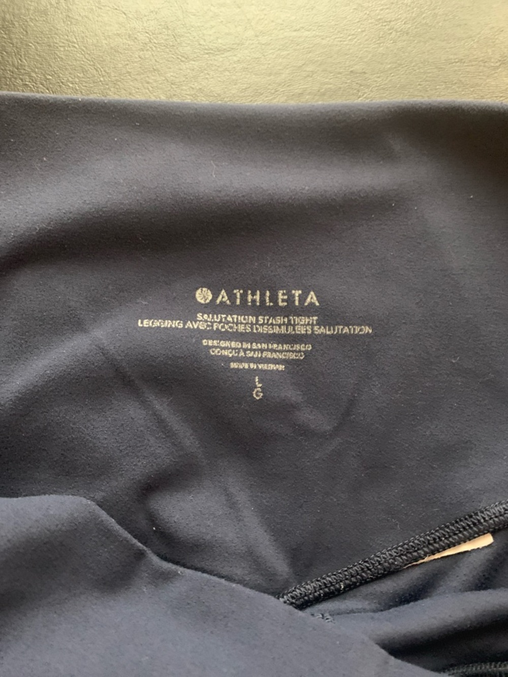 Athleta Navy Salutation Stash Tight, Sz L, 25in GUC, some wash wear - Picture 2 of 6